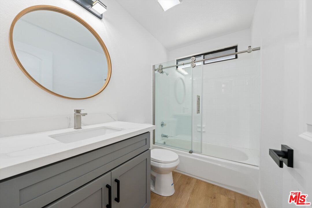 67350 Medano Road Cathedral City, CA 92234 - Photo 13 of 20 a bathroom with a sink a toilet and a mirror