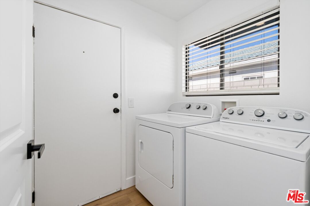 67350 Medano Road Cathedral City, CA 92234 - Photo 18 of 20 a view of bathroom with a washer and dryer