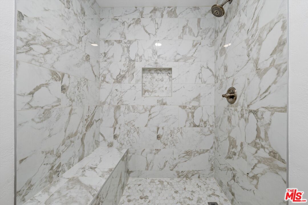 67350 Medano Road Cathedral City, CA 92234 - Photo 10 of 20 a bathroom with a shower