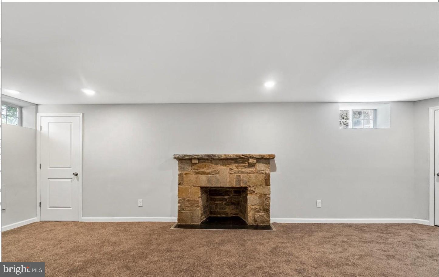 3400 Dennlyn Road Baltimore, MD 21215 - Photo 27 of 32 Cozy basement retreat with stone fireplace.