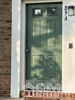 44 Judson Street, Unit 9A Edison, NJ 08837 - Photo 11 of 12 a bathroom with a glass door