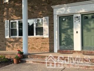 44 Judson Street, Unit 9A Edison, NJ 08837 - Photo 12 of 12 a view of a brick house with front door