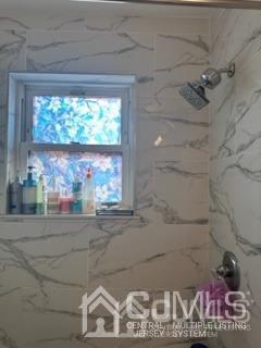 44 Judson Street, Unit 9A Edison, NJ 08837 - Photo 7 of 12 a bathroom with a window