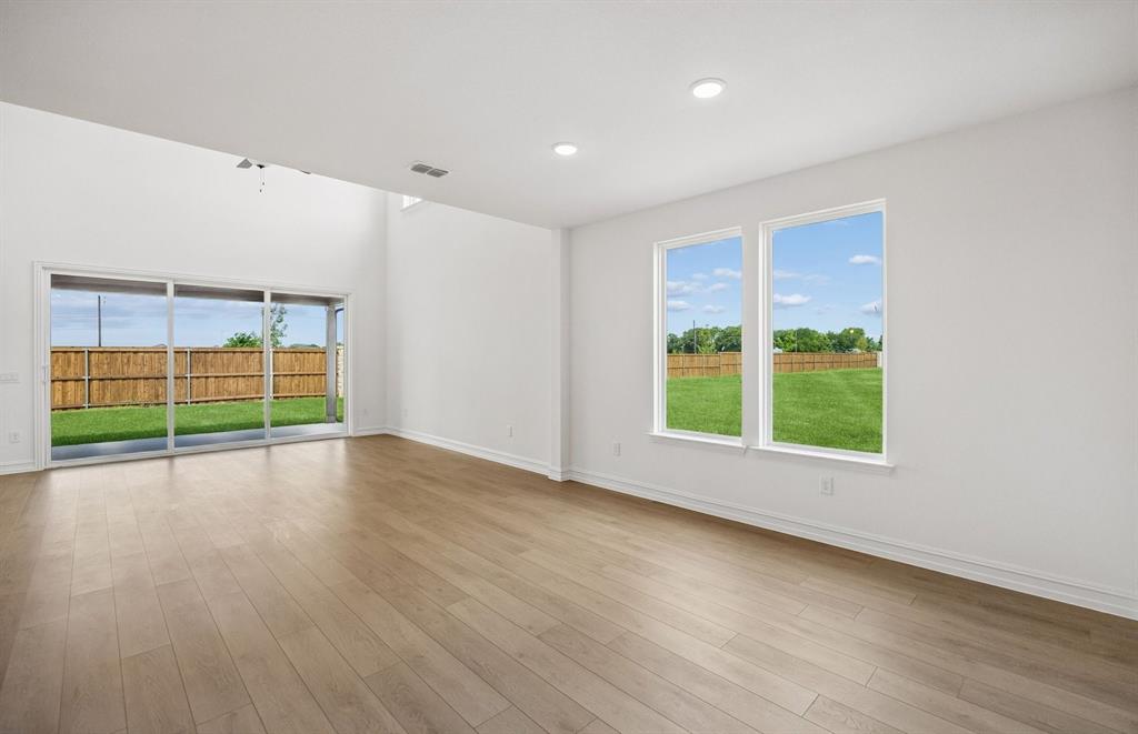1809 Ridgedale Street Celina, TX 75009 - Photo 8 of 22 *Floorplan representation, not actual home - Spacious gathering room with large windows