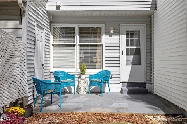 a building outdoor space with patio furniture