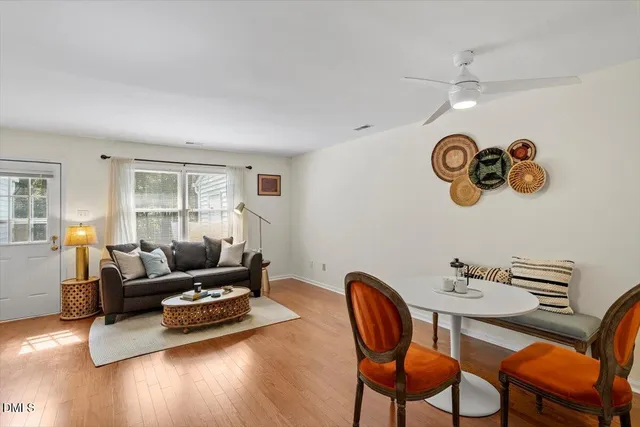 a living room with furniture and a table