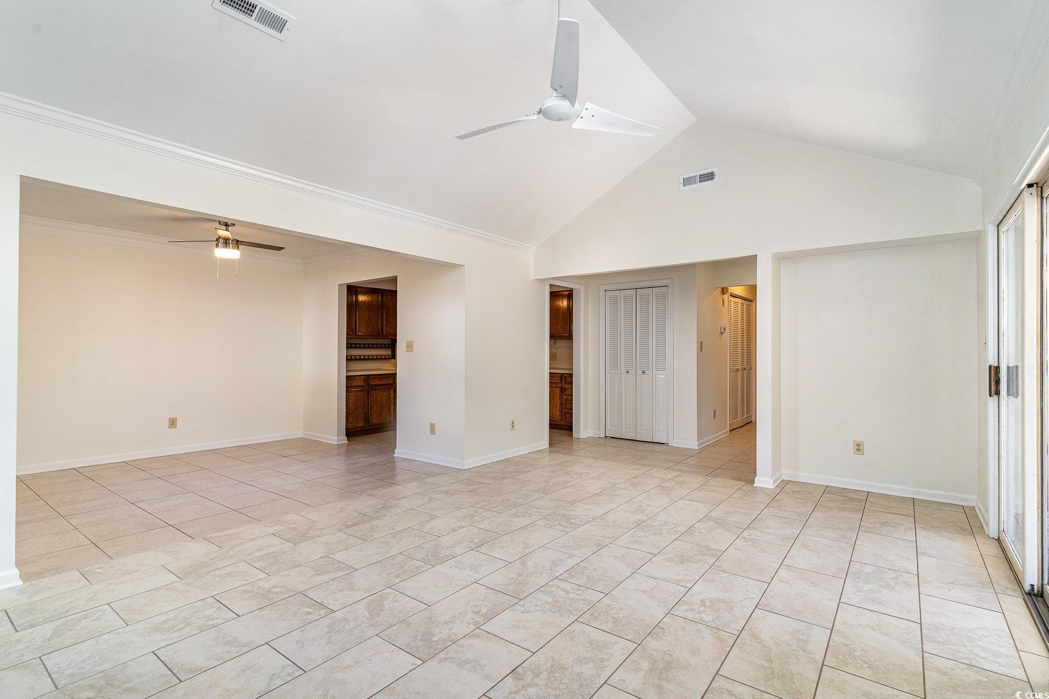 783 Kittiwake Lane Murrells Inlet, SC 29576 - Photo 9 of 21 Spare room with high vaulted ceiling, ceiling fan,