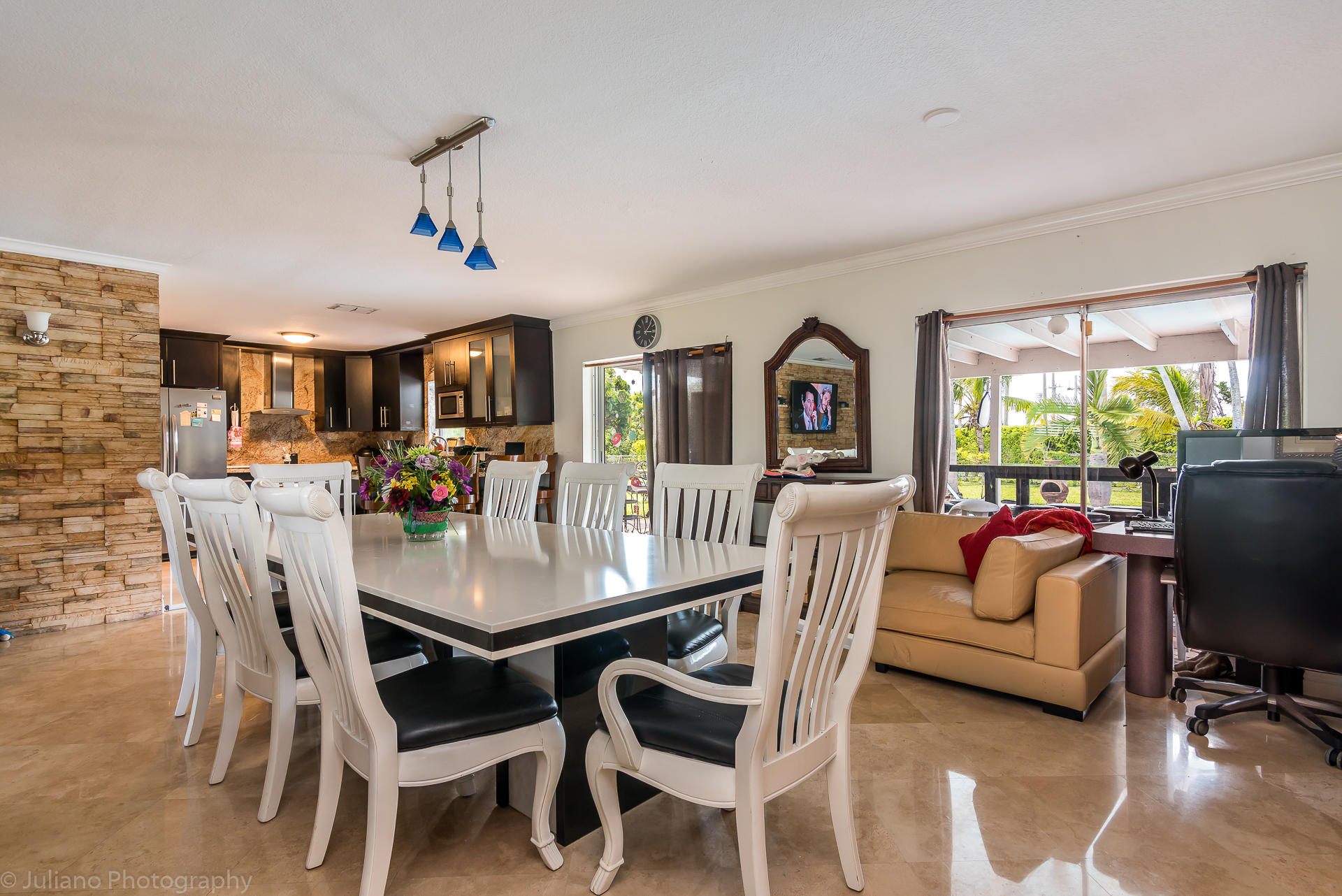 4971 Ataman Street Boca Raton, FL 33428 - Photo 4 of 27 a view of a dining room with furniture and a livingroom
