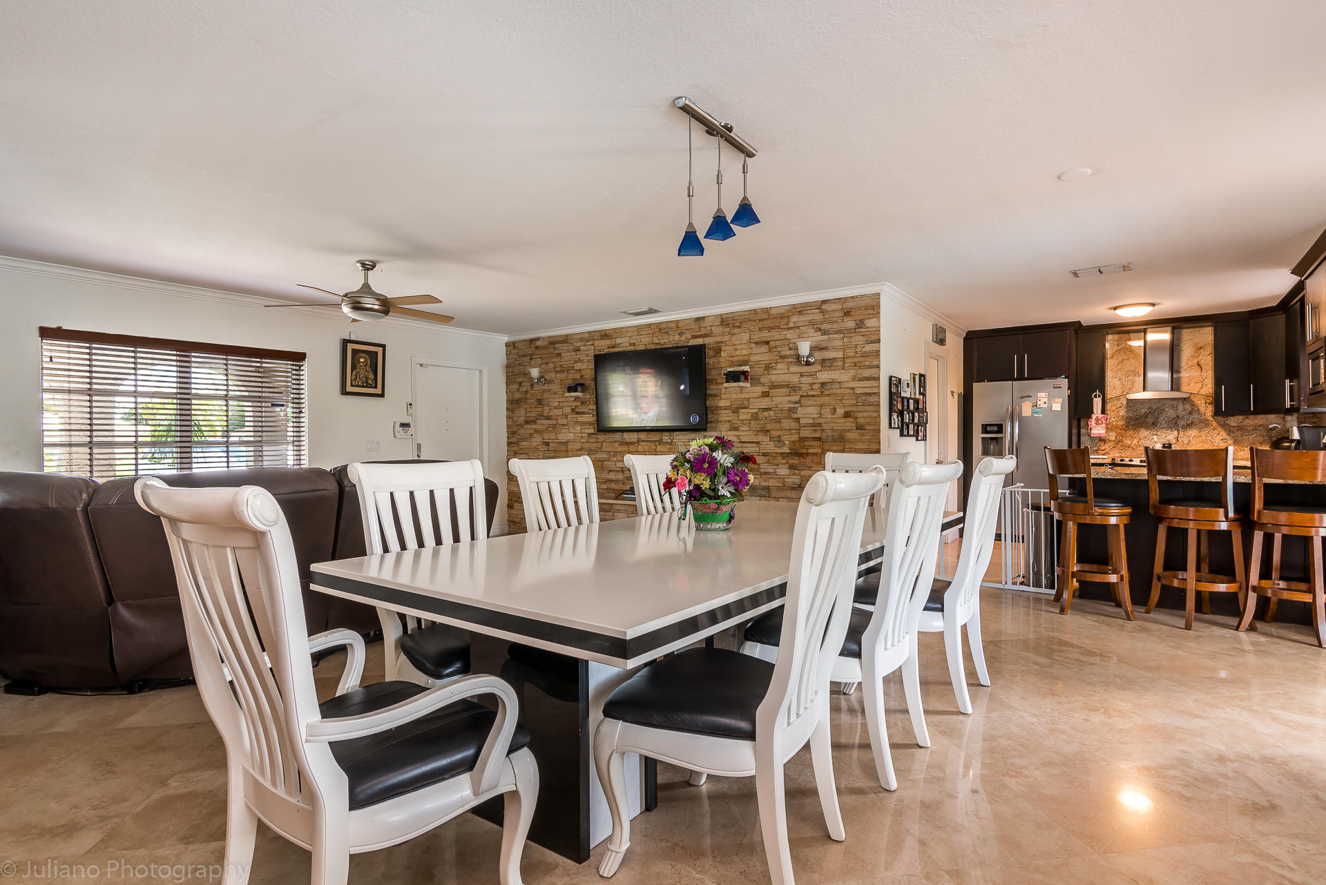4971 Ataman Street Boca Raton, FL 33428 - Photo 5 of 27 a view of a dining room with furniture