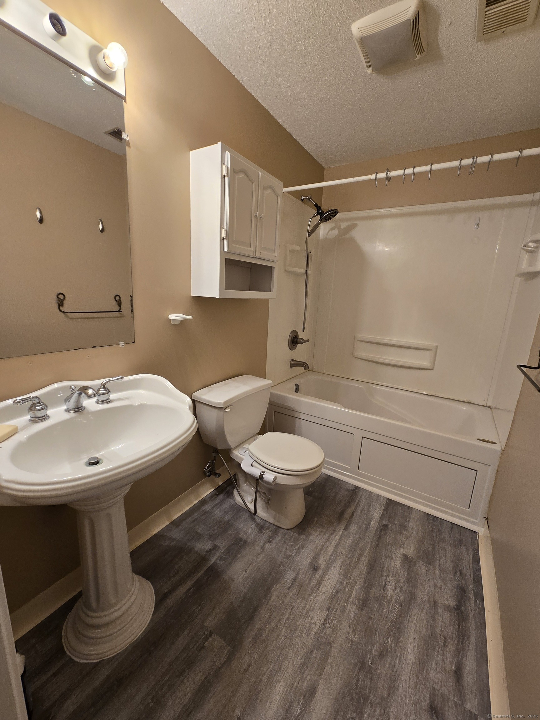 5 Periwinkle Lane, Unit 5 Glastonbury, CT 06033 - Photo 22 of 23 a bathroom with a sink toilet and shower