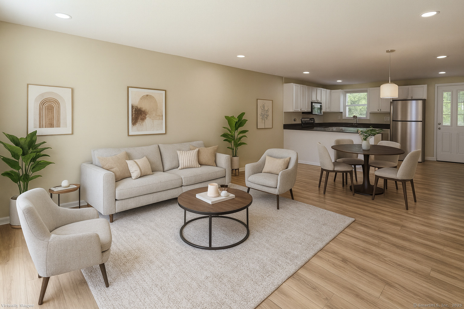 5 Periwinkle Lane, Unit 5 Glastonbury, CT 06033 - Photo 4 of 23 a living room with furniture and kitchen view