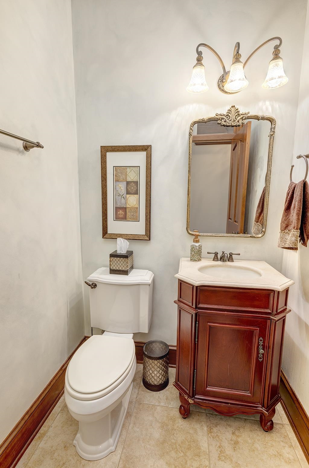 7417 Winding Way Roscoe, IL 61073 - Photo 14 of 40 a bathroom with a sink toilet and mirror