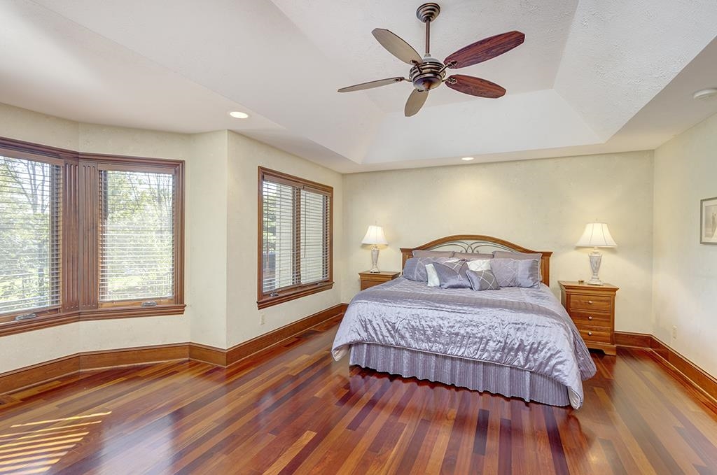 7417 Winding Way Roscoe, IL 61073 - Photo 17 of 40 a bedroom with a bed and window