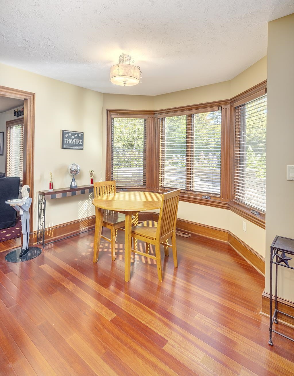 7417 Winding Way Roscoe, IL 61073 - Photo 25 of 40 a view of a dining room with furniture window and wooden floor