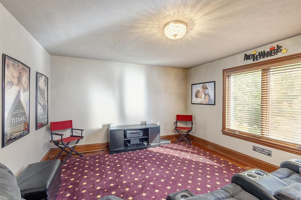 7417 Winding Way Roscoe, IL 61073 - Photo 26 of 40 a living room with furniture a rug and a window