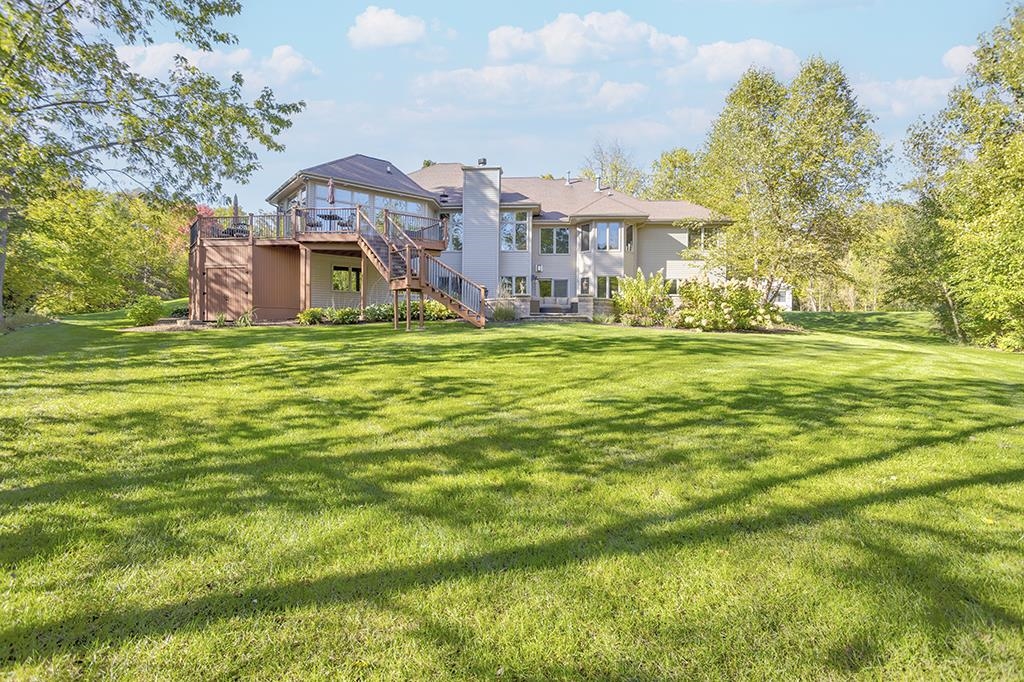 7417 Winding Way Roscoe, IL 61073 - Photo 33 of 40 a front view of a house with a yard