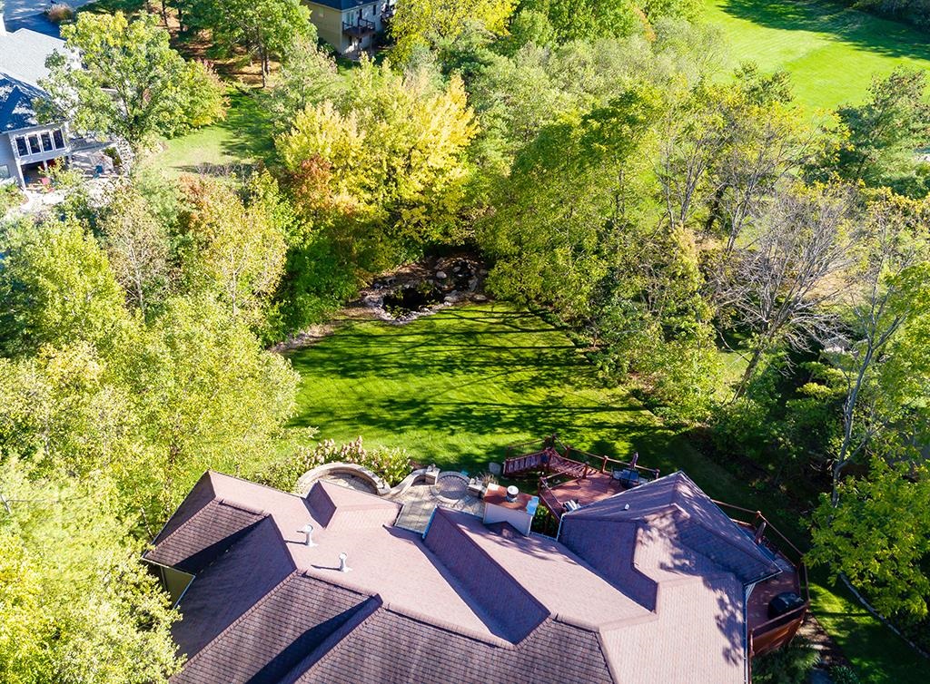 7417 Winding Way Roscoe, IL 61073 - Photo 37 of 40 a view of yard from deck with outdoor seating