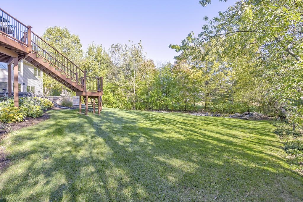 7417 Winding Way Roscoe, IL 61073 - Photo 39 of 40 a view of a yard with a tree