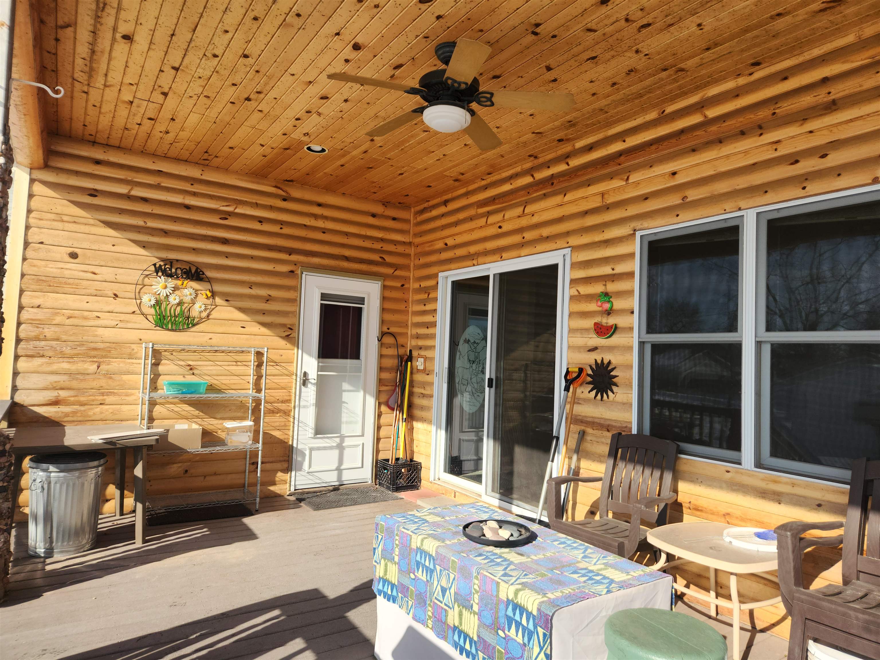 608 West 3rd Street Washburn, WI 54891 - Photo 21 of 26 Has covered ceiling, fan and access to the back yard