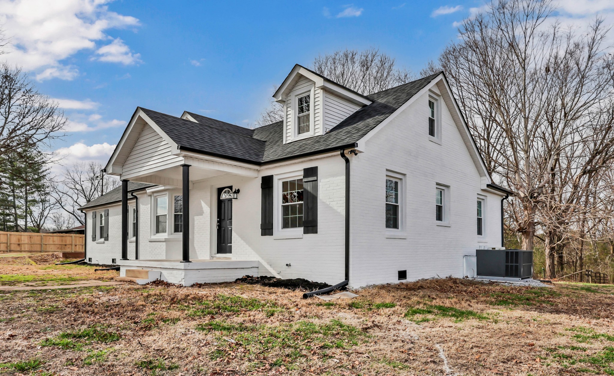 3436 State Highway 48 Cunningham, TN 37052 - Photo 2 of 45 a front view of a house with a yard