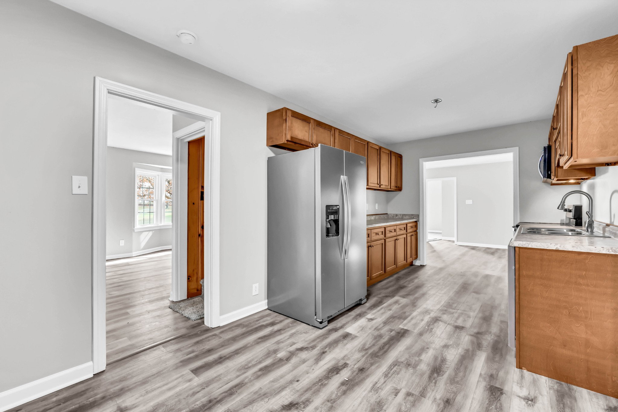 3436 State Highway 48 Cunningham, TN 37052 - Photo 21 of 45 a kitchen with stainless steel appliances granite countertop a refrigerator and a sink