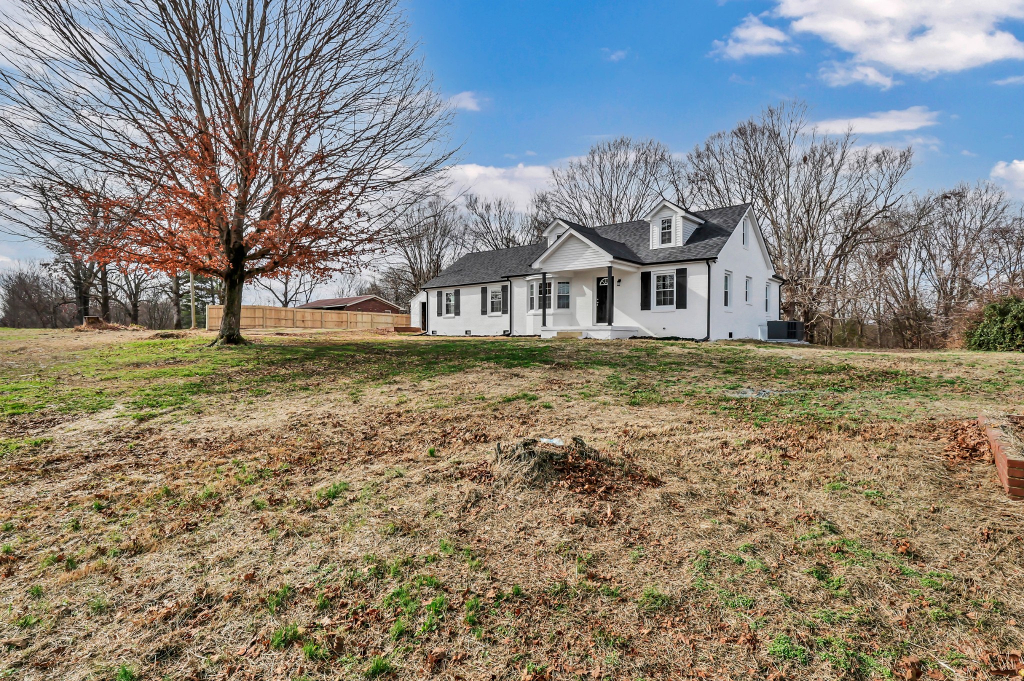 3436 State Highway 48 Cunningham, TN 37052 - Photo 3 of 45 a front view of a house with a yard