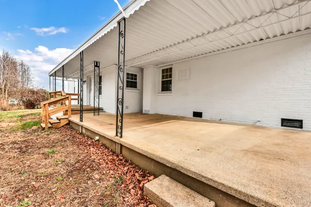 a house with trees in the background