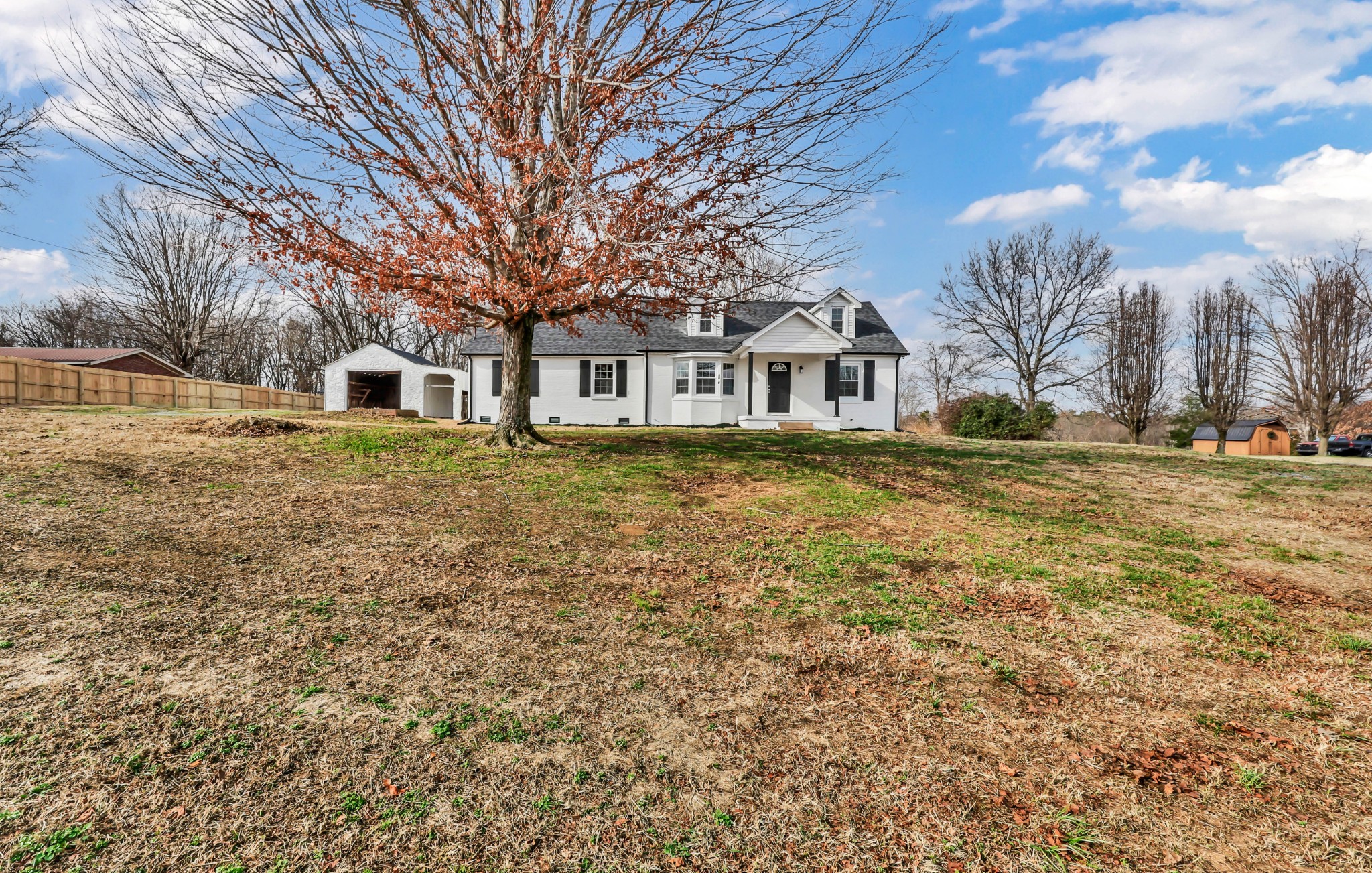 3436 State Highway 48 Cunningham, TN 37052 - Photo 4 of 45 a front view of a house with a yard