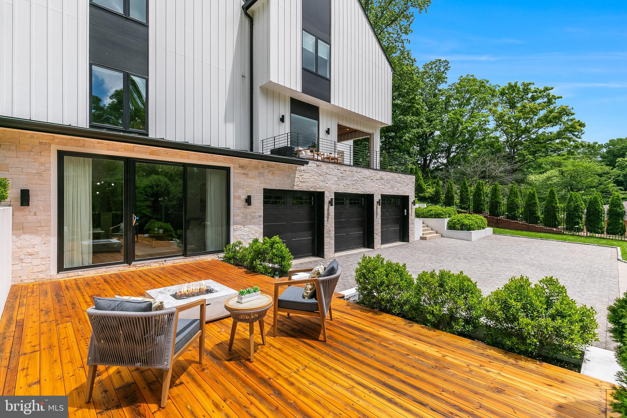 5914 Woodley Road McLean, VA 22101 - Photo 60 of 69 a view of a house with sitting area and garden