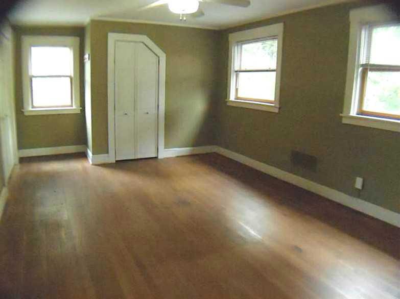 326 Castlegate Road Forest Hills, PA 15221 - Photo 18 of 25 Bedroom. This large bedroom has hardwood floor, lots of windows and 2 closets