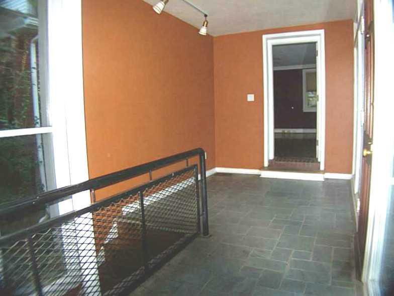 326 Castlegate Road Forest Hills, PA 15221 - Photo 6 of 25 Entry/Foyer. Slate tiled flooring in this open entry. The entrance connects the garage to the living room and music room