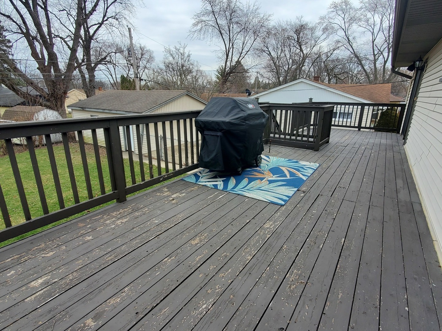153 Fletcher Drive Wheeling, IL 60090 - Photo 15 of 22 a view of a wooden deck