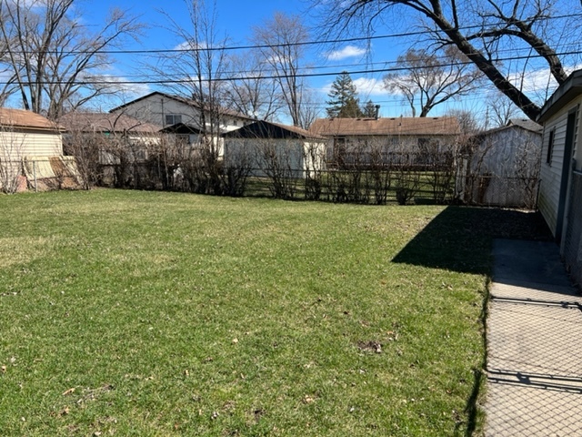 153 Fletcher Drive Wheeling, IL 60090 - Photo 22 of 22 a view of a back yard of the house