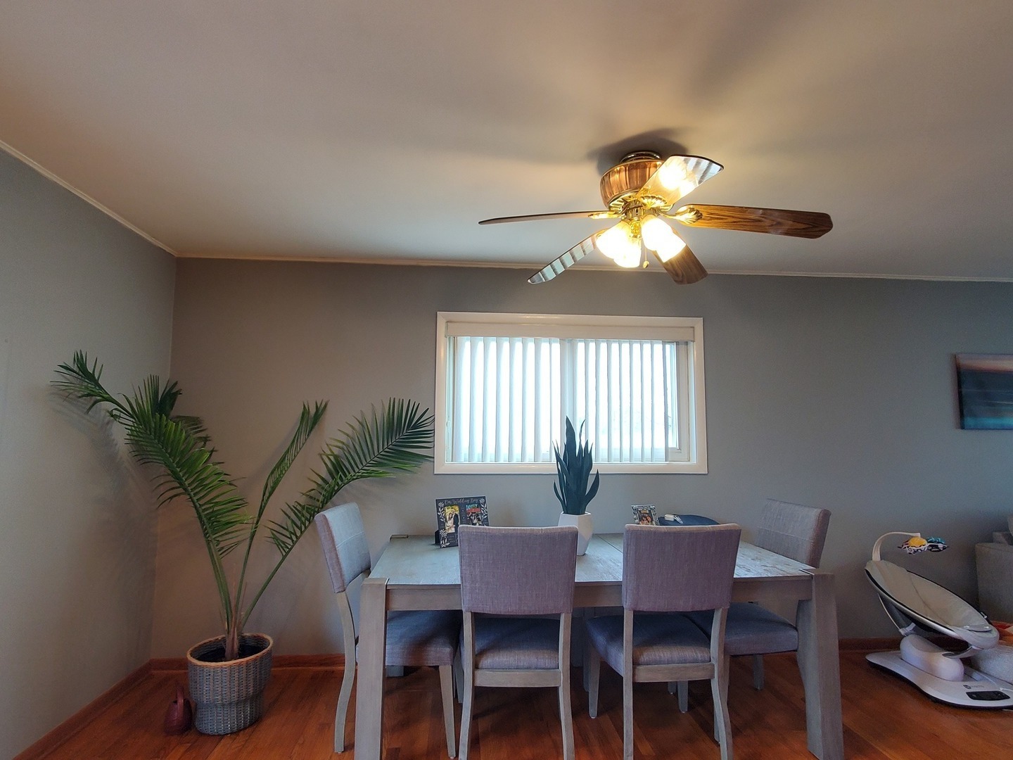 153 Fletcher Drive Wheeling, IL 60090 - Photo 5 of 22 a dining room with furniture and window