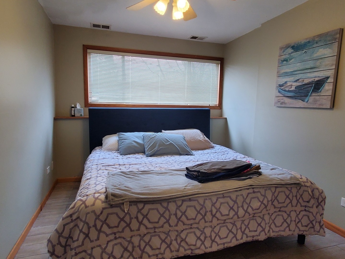 153 Fletcher Drive Wheeling, IL 60090 - Photo 10 of 22 a bedroom with a bed and a window