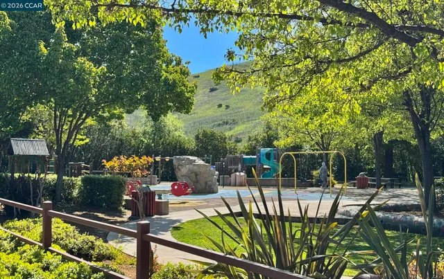 a view of a balcony with chairs