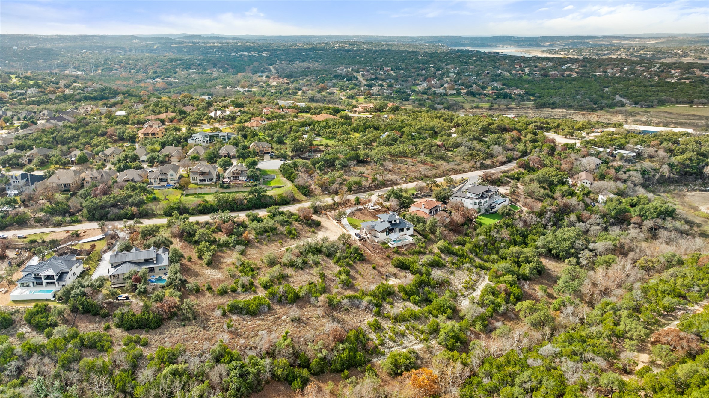 16130 Clara Van Street Austin, TX 78734 - Photo 14 of 20 Aerial overview of property's location featuring nearby suburban area