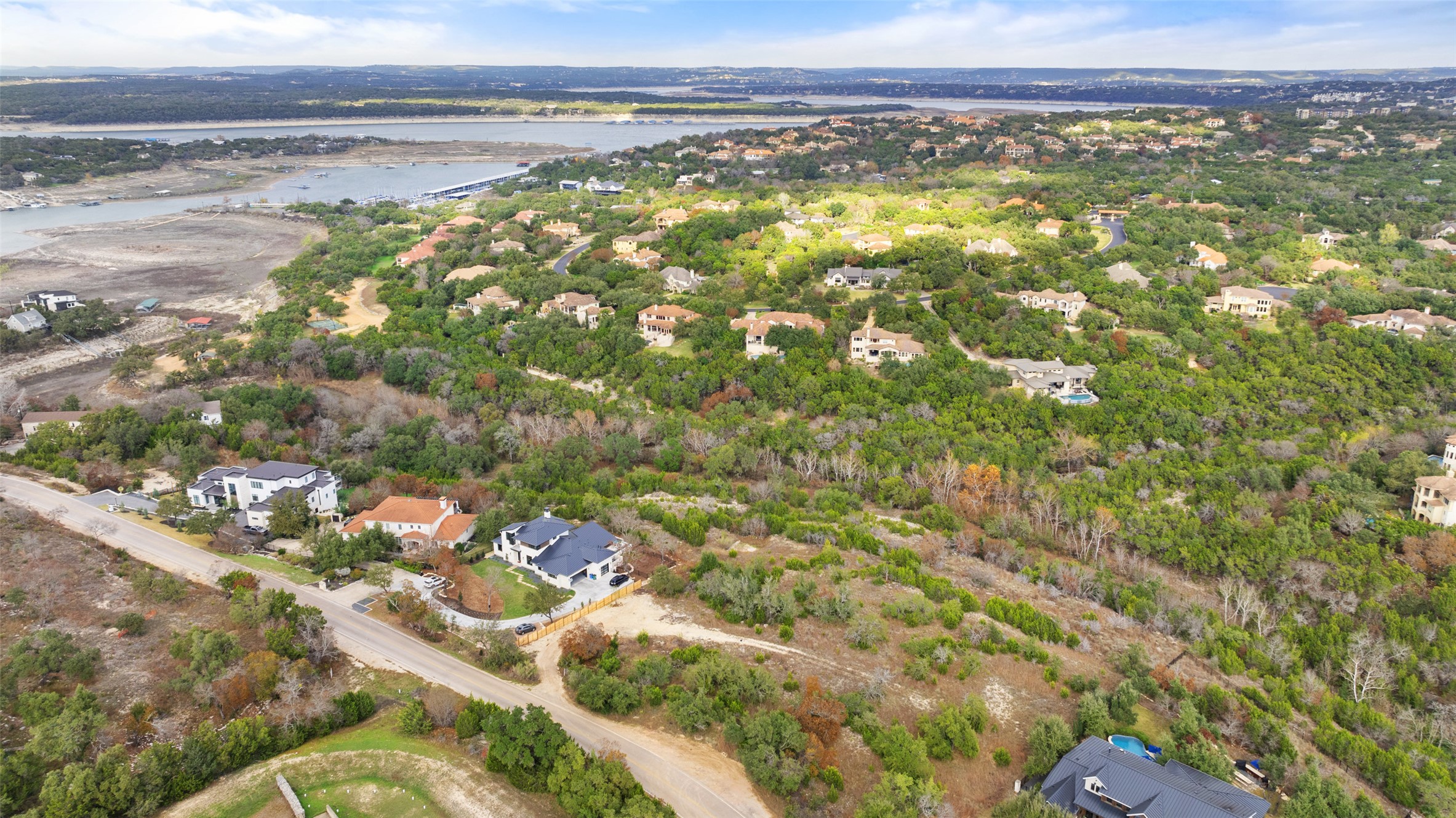 16130 Clara Van Street Austin, TX 78734 - Photo 10 of 20 Aerial view of property's location featuring a large body of water