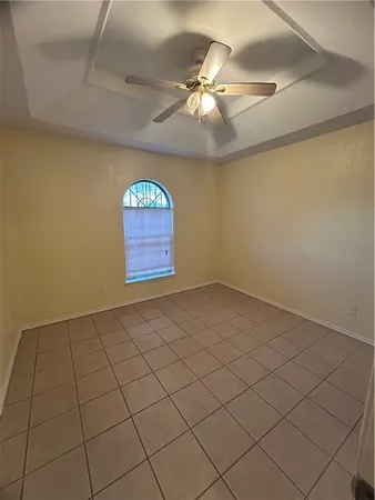 en empty room with windows
