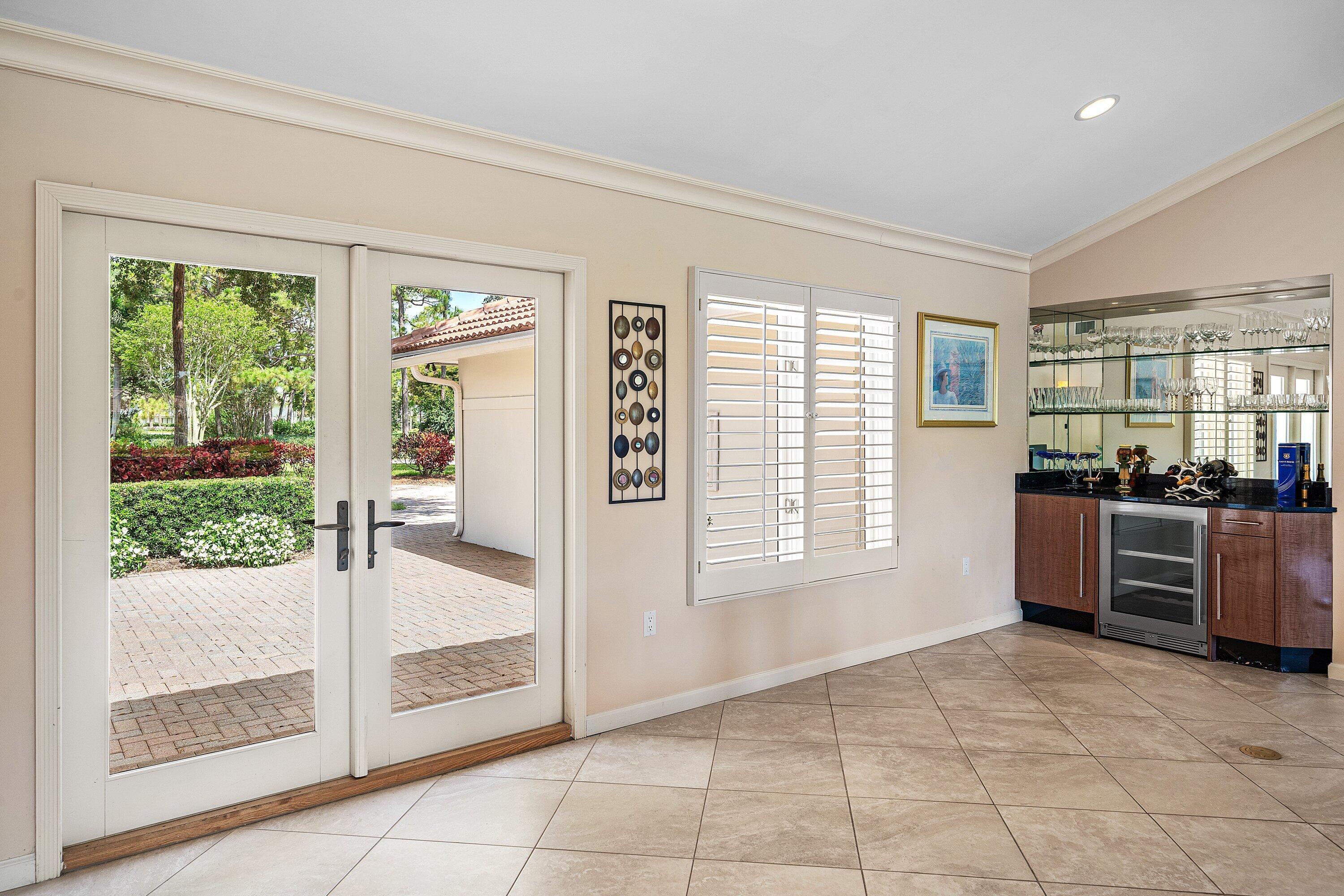 4365 Shell Drake Lane Boynton Beach, FL 33436 - Photo 6 of 56 a view of a kitchen with microwave and refrigerator