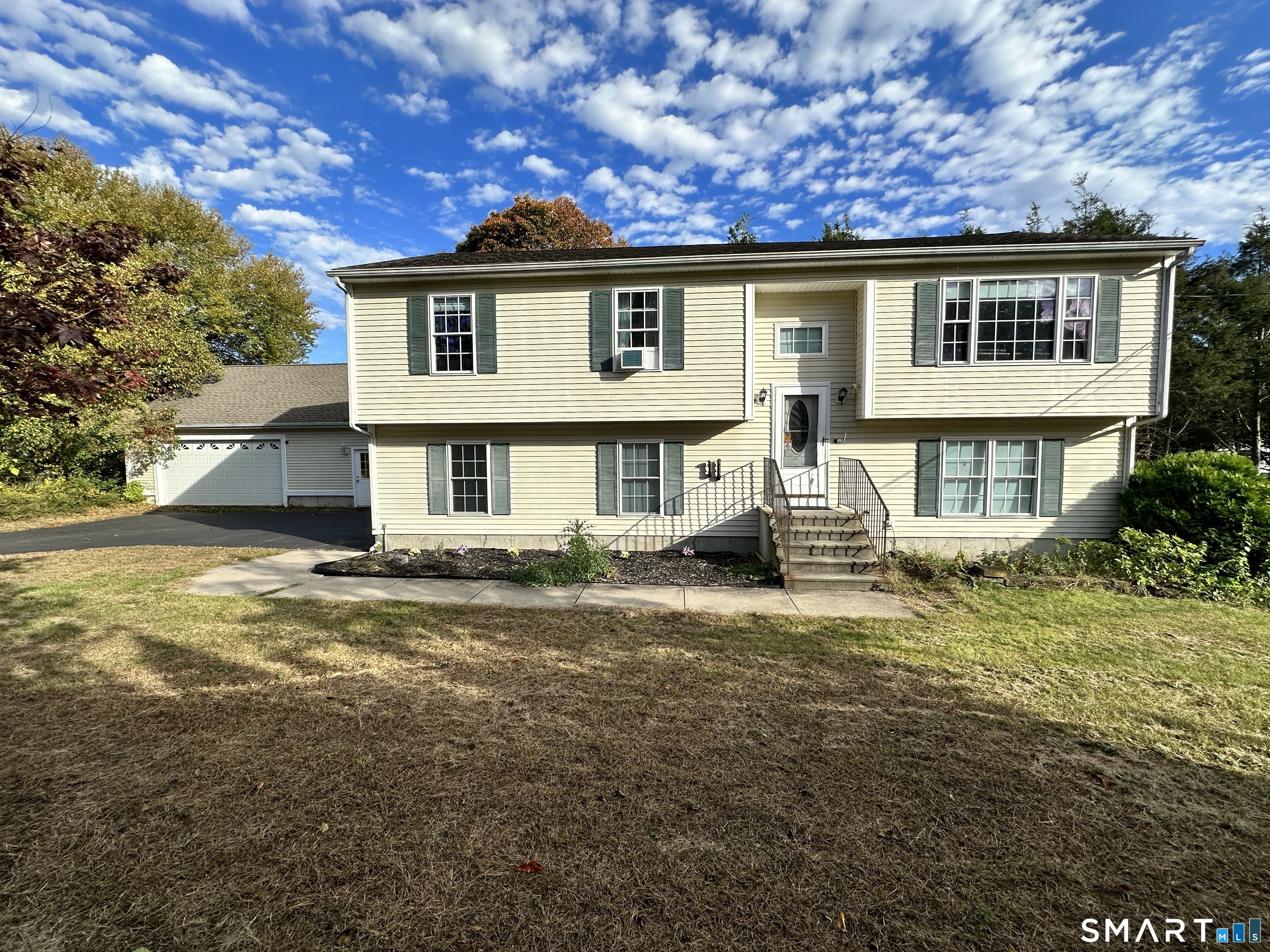 24 Quarry Street Norwich, CT 06360 - Photo 2 of 20 a view of a house with a swimming pool