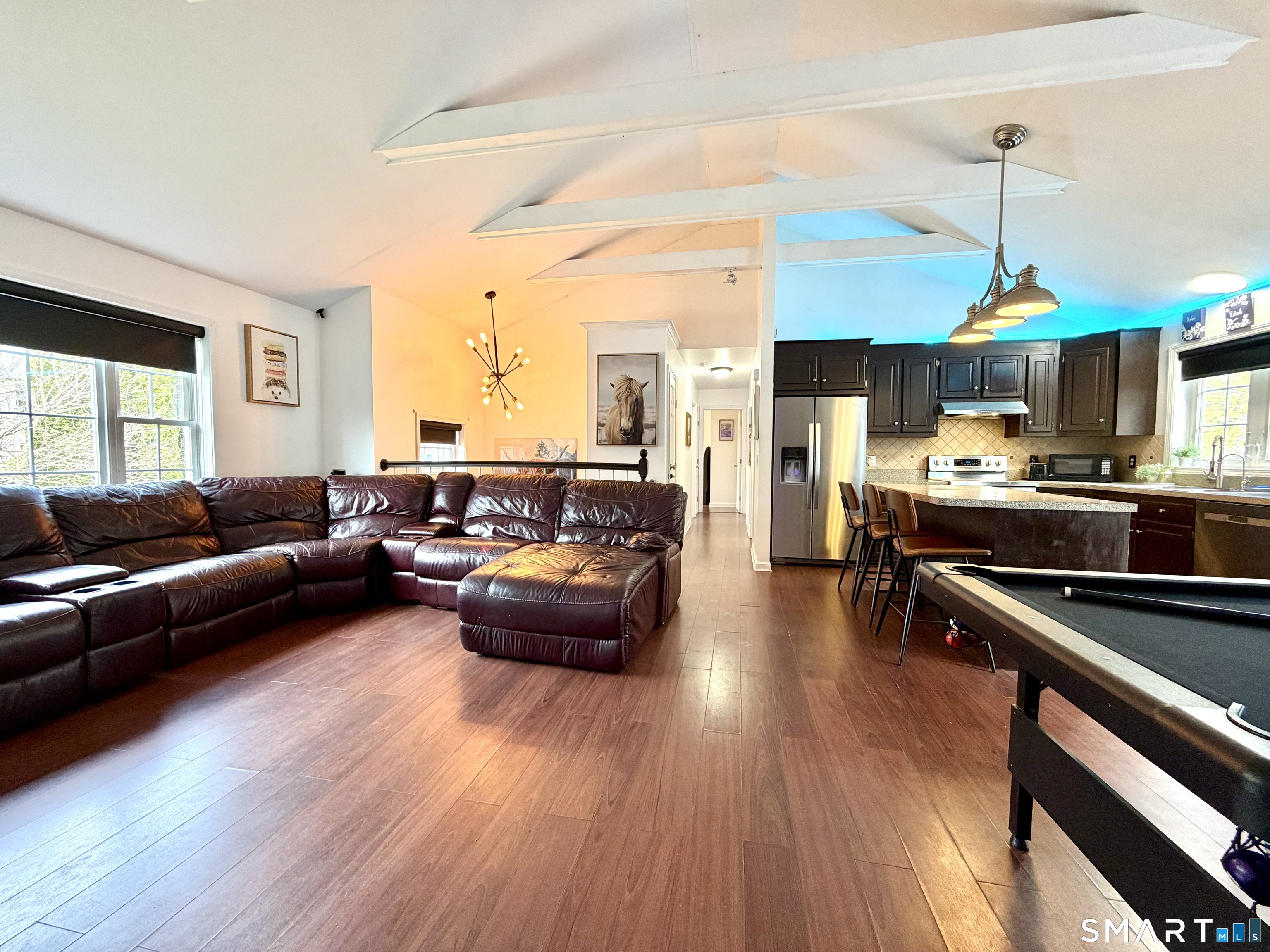 24 Quarry Street Norwich, CT 06360 - Photo 4 of 20 a living room with furniture and a wooden floor
