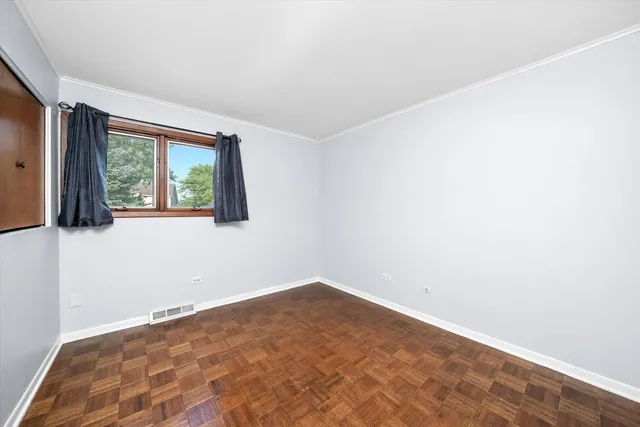 a view of a room that has a window in it