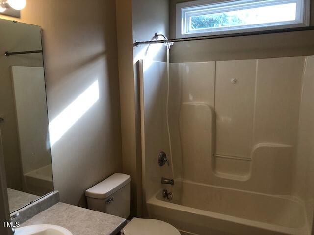 125 Hardaway Point Clayton, NC 27527 - Photo 13 of 17 a bathroom with a shower and a toilet