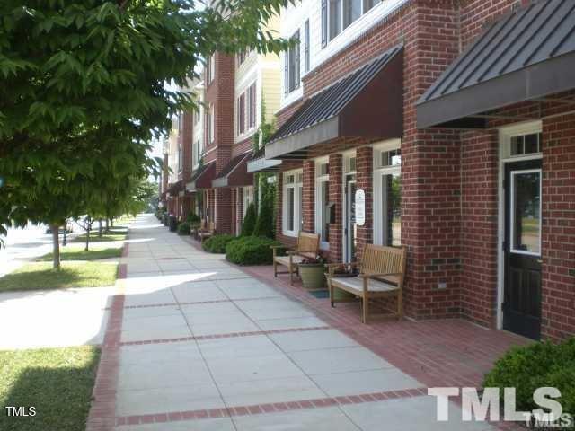 125 Hardaway Point Clayton, NC 27527 - Photo 15 of 17 a backyard of a house with outdoor seating