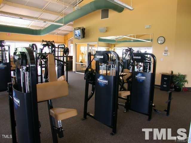 125 Hardaway Point Clayton, NC 27527 - Photo 16 of 17 a view of a room with gym equipment
