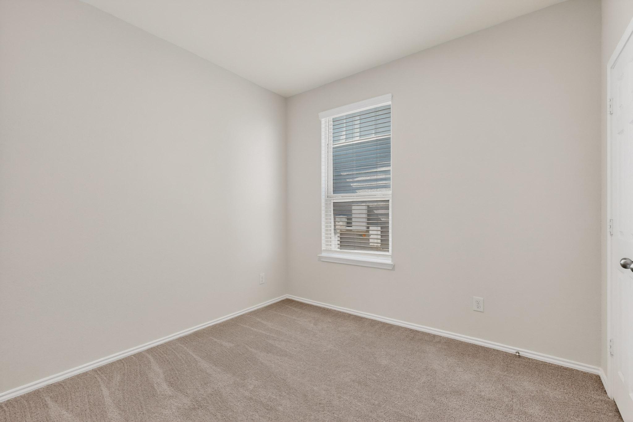 429 Stone Water Lane Jarrell, TX 76537 - Photo 26 of 37 an empty room with a window
