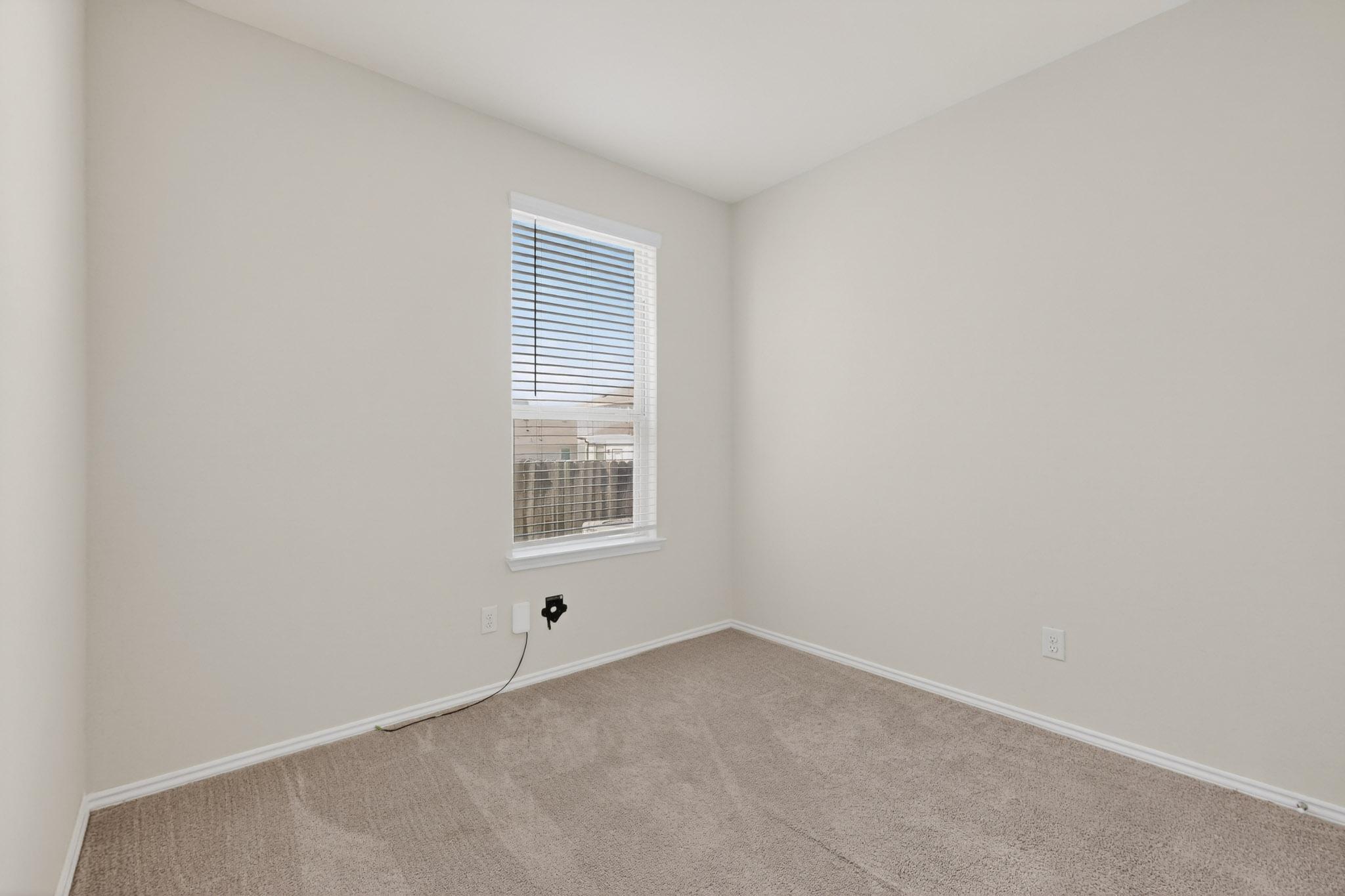 429 Stone Water Lane Jarrell, TX 76537 - Photo 29 of 37 an empty room with a window
