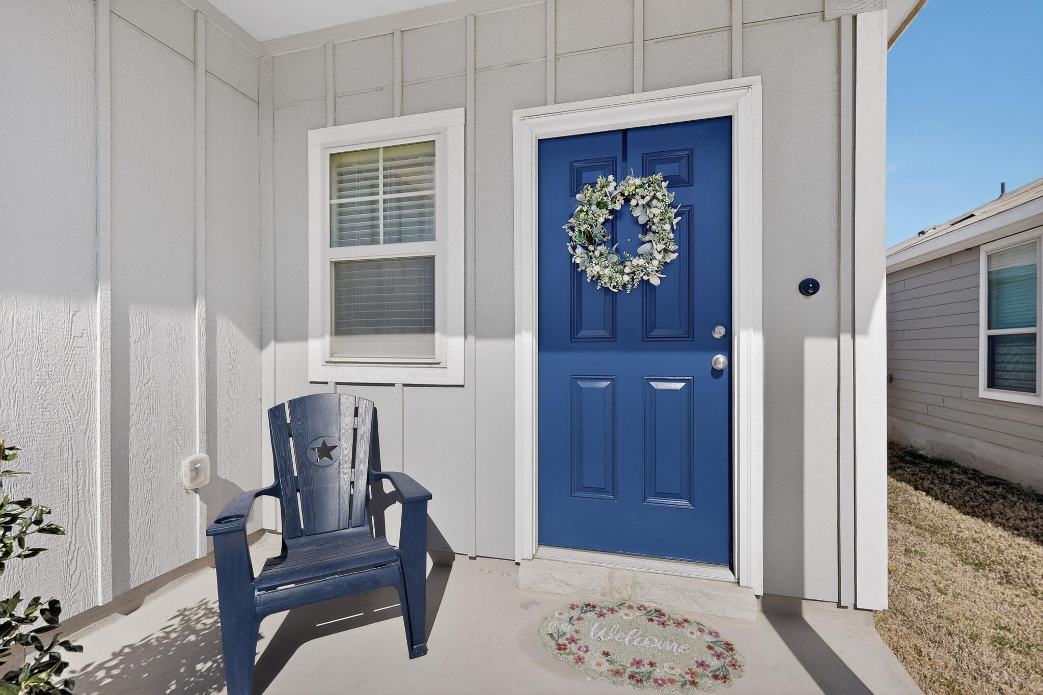 429 Stone Water Lane Jarrell, TX 76537 - Photo 3 of 37 a view of a hallway with chairs and a potted plant