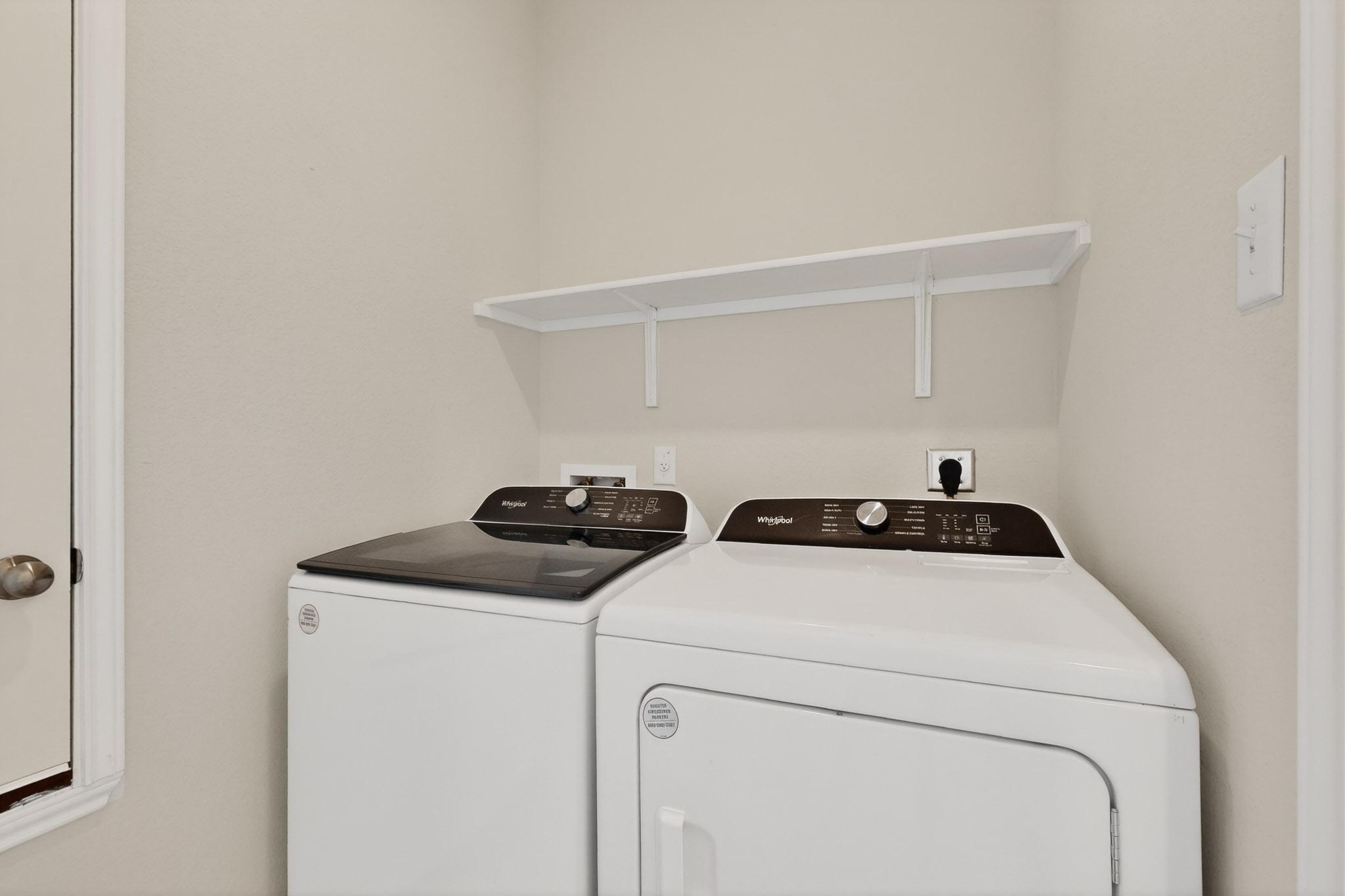 429 Stone Water Lane Jarrell, TX 76537 - Photo 30 of 37 a utility room with dryer and washer